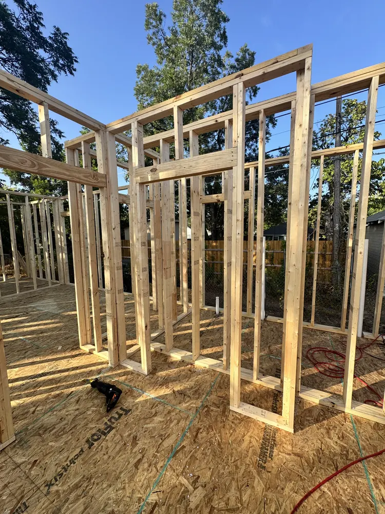 Interior wall framing with subfloor and plumbing stub-outs